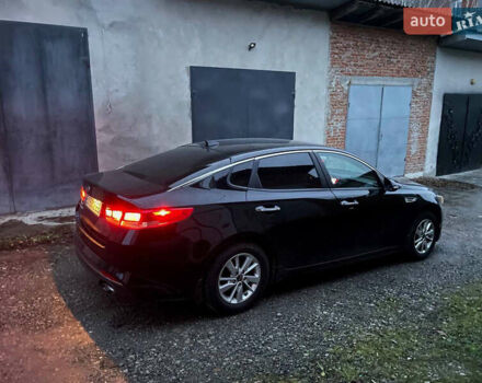 Черный Киа Оптима, объемом двигателя 2.36 л и пробегом 110 тыс. км за 10400 $, фото 5 на Automoto.ua