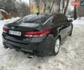 Чорний Кіа Оптіма, об'ємом двигуна 2 л та пробігом 70 тис. км за 17900 $, фото 1 на Automoto.ua