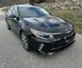 Черный Киа Оптима, объемом двигателя 2 л и пробегом 42 тыс. км за 8000 $, фото 1 на Automoto.ua