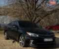 Чорний Кіа Оптіма, об'ємом двигуна 2 л та пробігом 82 тис. км за 13500 $, фото 1 на Automoto.ua
