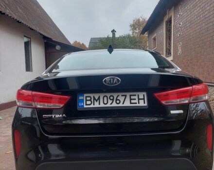 Черный Киа Оптима, объемом двигателя 2 л и пробегом 94 тыс. км за 330 $, фото 1 на Automoto.ua