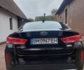 Черный Киа Оптима, объемом двигателя 2 л и пробегом 94 тыс. км за 330 $, фото 1 на Automoto.ua