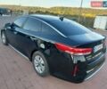Чорний Кіа Оптіма, об'ємом двигуна 2 л та пробігом 232 тис. км за 13500 $, фото 4 на Automoto.ua
