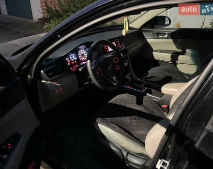 Черный Киа Оптима, объемом двигателя 2.36 л и пробегом 110 тыс. км за 10400 $, фото 11 на Automoto.ua