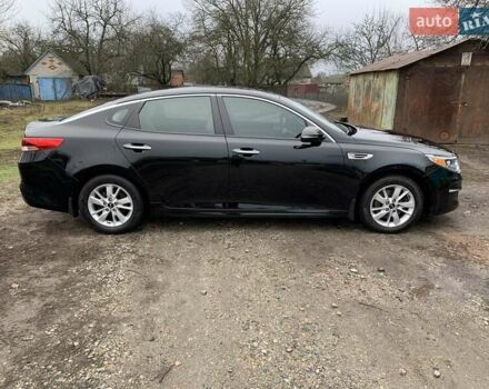 Черный Киа Оптима, объемом двигателя 2.36 л и пробегом 132 тыс. км за 10800 $, фото 1 на Automoto.ua