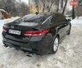 Чорний Кіа Оптіма, об'ємом двигуна 2 л та пробігом 70 тис. км за 17900 $, фото 1 на Automoto.ua