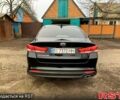 Чорний Кіа Оптіма, об'ємом двигуна 2.4 л та пробігом 132 тис. км за 11800 $, фото 4 на Automoto.ua