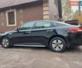 Чорний Кіа Оптіма, об'ємом двигуна 2 л та пробігом 94 тис. км за 13400 $, фото 3 на Automoto.ua