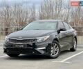 Черный Киа Оптима, объемом двигателя 2.36 л и пробегом 235 тыс. км за 11500 $, фото 1 на Automoto.ua