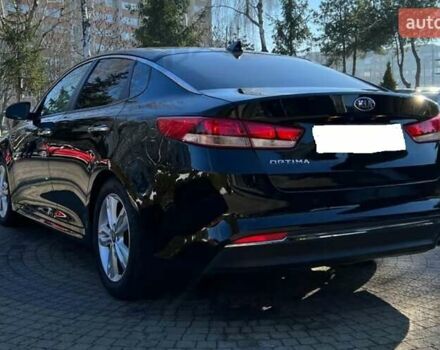 Черный Киа Оптима, объемом двигателя 2.4 л и пробегом 54 тыс. км за 13500 $, фото 1 на Automoto.ua