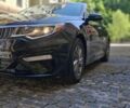 Черный Киа Оптима, объемом двигателя 2.4 л и пробегом 235 тыс. км за 11200 $, фото 1 на Automoto.ua