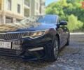 Черный Киа Оптима, объемом двигателя 2.36 л и пробегом 235 тыс. км за 10800 $, фото 1 на Automoto.ua
