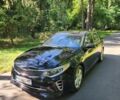 Чорний Кіа Оптіма, об'ємом двигуна 2.4 л та пробігом 140 тис. км за 11900 $, фото 1 на Automoto.ua