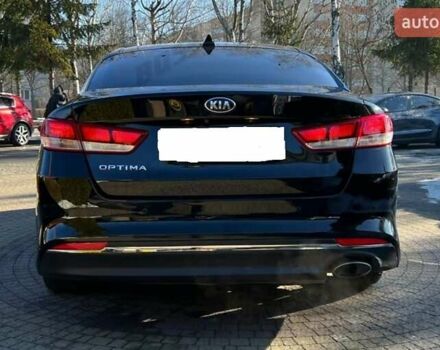 Черный Киа Оптима, объемом двигателя 2.4 л и пробегом 54 тыс. км за 13500 $, фото 2 на Automoto.ua