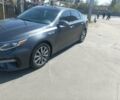 Черный Киа Оптима, объемом двигателя 1.6 л и пробегом 74 тыс. км за 13800 $, фото 1 на Automoto.ua