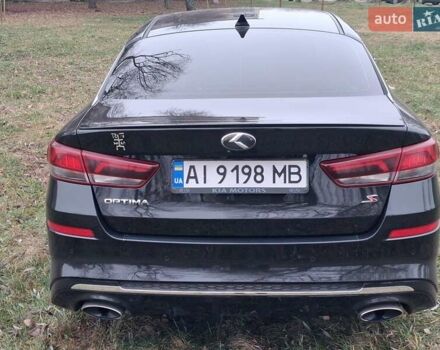 Черный Киа Оптима, объемом двигателя 2.36 л и пробегом 134 тыс. км за 14300 $, фото 2 на Automoto.ua