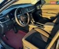 Черный Киа Оптима, объемом двигателя 2.36 л и пробегом 46 тыс. км за 15000 $, фото 11 на Automoto.ua