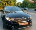Черный Киа Оптима, объемом двигателя 1.7 л и пробегом 82 тыс. км за 12800 $, фото 1 на Automoto.ua