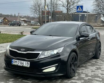 Черный Киа Оптима, объемом двигателя 2 л и пробегом 240 тыс. км за 6950 $, фото 1 на Automoto.ua