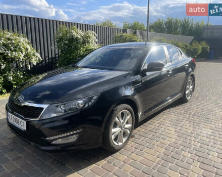 Черный Киа Оптима, объемом двигателя 2 л и пробегом 164 тыс. км за 10500 $, фото 1 на Automoto.ua