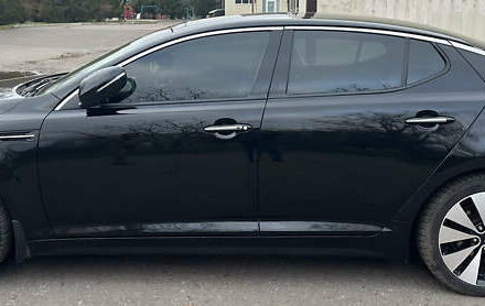 Черный Киа Оптима, объемом двигателя 2.4 л и пробегом 210 тыс. км за 9500 $, фото 1 на Automoto.ua