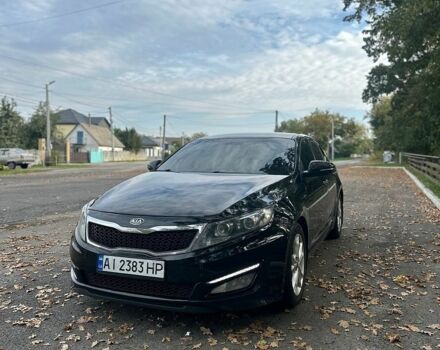 Чорний Кіа Оптіма, об'ємом двигуна 2 л та пробігом 399 тис. км за 7300 $, фото 1 на Automoto.ua