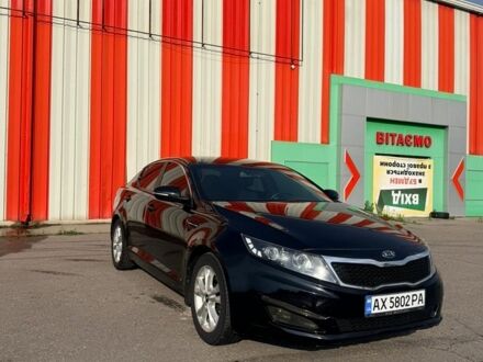 Чорний Кіа Оптіма, об'ємом двигуна 2 л та пробігом 162 тис. км за 8199 $, фото 1 на Automoto.ua