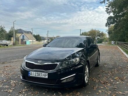 Чорний Кіа Оптіма, об'ємом двигуна 2 л та пробігом 399 тис. км за 7300 $, фото 1 на Automoto.ua