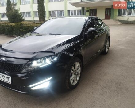 Чорний Кіа Оптіма, об'ємом двигуна 1.69 л та пробігом 325 тис. км за 8200 $, фото 1 на Automoto.ua