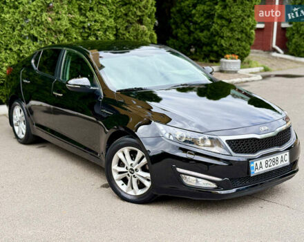 Чорний Кіа Оптіма, об'ємом двигуна 2 л та пробігом 177 тис. км за 9700 $, фото 1 на Automoto.ua
