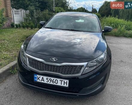 Черный Киа Оптима, объемом двигателя 2.36 л и пробегом 77 тыс. км за 6300 $, фото 1 на Automoto.ua