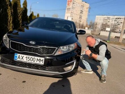 Черный Киа Оптима, объемом двигателя 2.36 л и пробегом 224 тыс. км за 10800 $, фото 1 на Automoto.ua