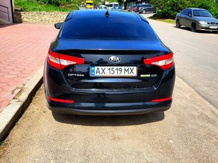 Чорний Кіа Оптіма, об'ємом двигуна 2.4 л та пробігом 200 тис. км за 10780 $, фото 1 на Automoto.ua