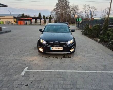 Черный Киа Оптима, объемом двигателя 2.36 л и пробегом 251 тыс. км за 9750 $, фото 1 на Automoto.ua