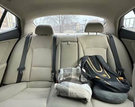 Черный Киа Оптима, объемом двигателя 2.4 л и пробегом 200 тыс. км за 8300 $, фото 1 на Automoto.ua