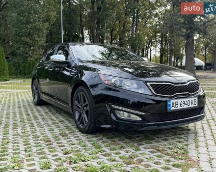 Черный Киа Оптима, объемом двигателя 2 л и пробегом 77 тыс. км за 11300 $, фото 1 на Automoto.ua