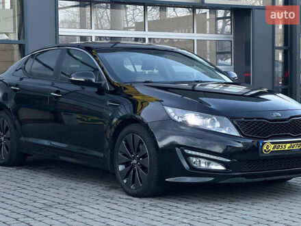 Чорний Кіа Оптіма, об'ємом двигуна 2.36 л та пробігом 140 тис. км за 11800 $, фото 1 на Automoto.ua