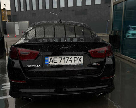 Черный Киа Оптима, объемом двигателя 2 л и пробегом 174 тыс. км за 12000 $, фото 1 на Automoto.ua