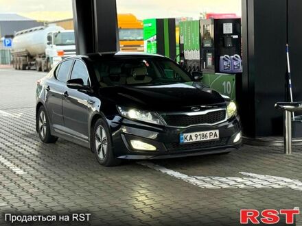 Черный Киа Оптима, объемом двигателя 2.4 л и пробегом 252 тыс. км за 10000 $, фото 1 на Automoto.ua