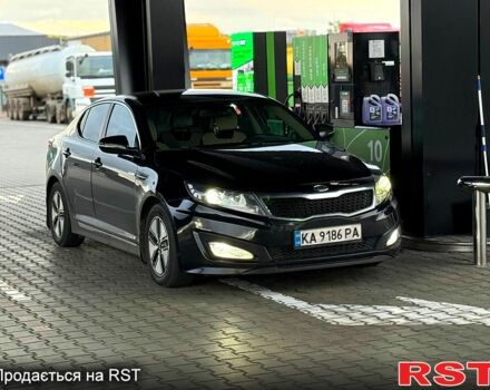 Черный Киа Оптима, объемом двигателя 2.4 л и пробегом 252 тыс. км за 10000 $, фото 1 на Automoto.ua