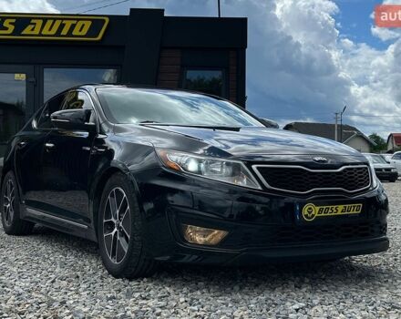 Черный Киа Оптима, объемом двигателя 2.36 л и пробегом 236 тыс. км за 11600 $, фото 1 на Automoto.ua