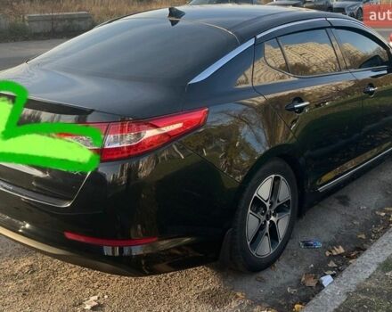 Черный Киа Оптима, объемом двигателя 2.4 л и пробегом 200 тыс. км за 5900 $, фото 1 на Automoto.ua