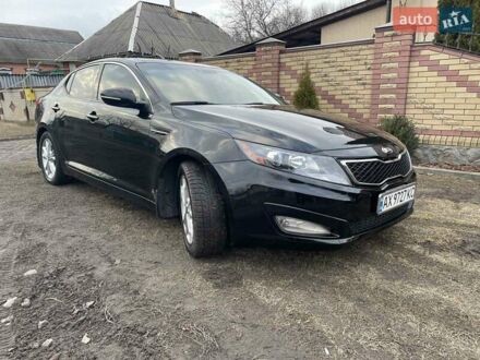 Черный Киа Оптима, объемом двигателя 2 л и пробегом 176 тыс. км за 9600 $, фото 1 на Automoto.ua