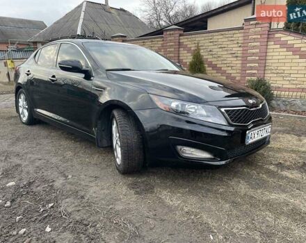 Черный Киа Оптима, объемом двигателя 2 л и пробегом 176 тыс. км за 9600 $, фото 1 на Automoto.ua