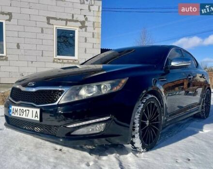 Черный Киа Оптима, объемом двигателя 2 л и пробегом 220 тыс. км за 9600 $, фото 1 на Automoto.ua