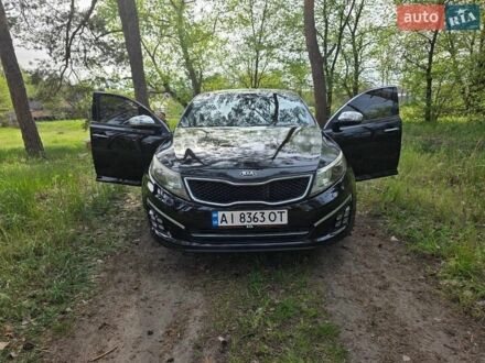 Черный Киа Оптима, объемом двигателя 2 л и пробегом 145 тыс. км за 11750 $, фото 1 на Automoto.ua