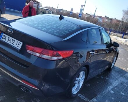 Чорний Кіа Оптіма, об'ємом двигуна 2 л та пробігом 248 тис. км за 12292 $, фото 1 на Automoto.ua