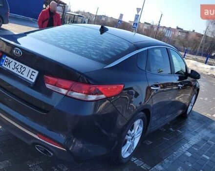 Черный Киа Оптима, объемом двигателя 2.5 л и пробегом 248 тыс. км за 12000 $, фото 1 на Automoto.ua