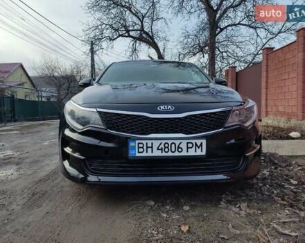 Черный Киа Оптима, объемом двигателя 2.36 л и пробегом 150 тыс. км за 10800 $, фото 1 на Automoto.ua