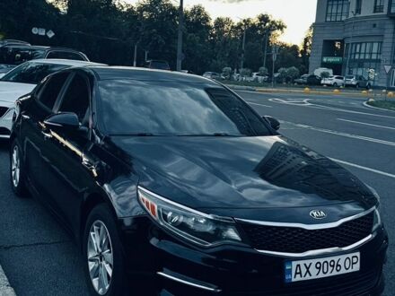 Черный Киа Оптима, объемом двигателя 2.36 л и пробегом 209 тыс. км за 11500 $, фото 1 на Automoto.ua